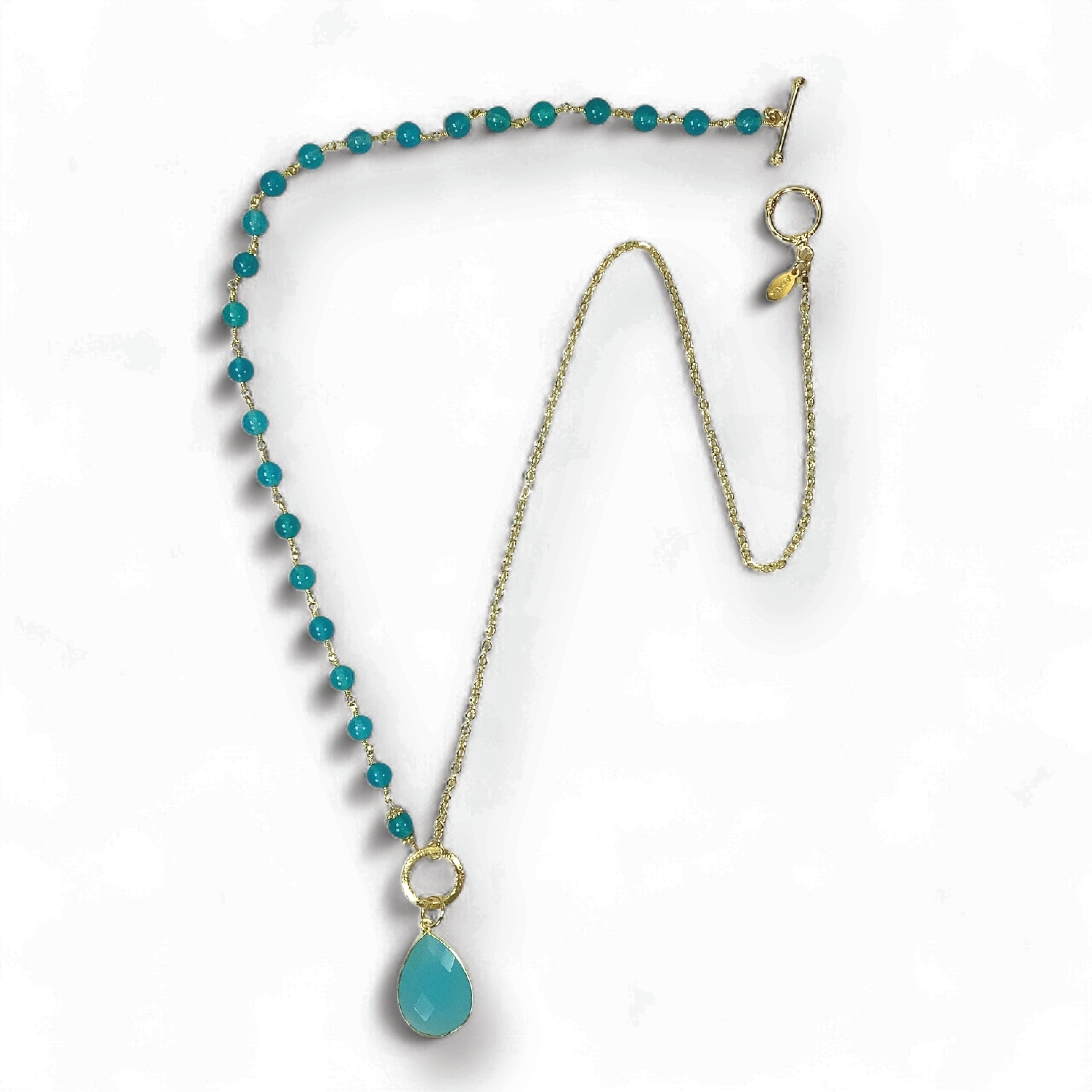 NECKLACES featuring a luxurious turquoise gemstone design.