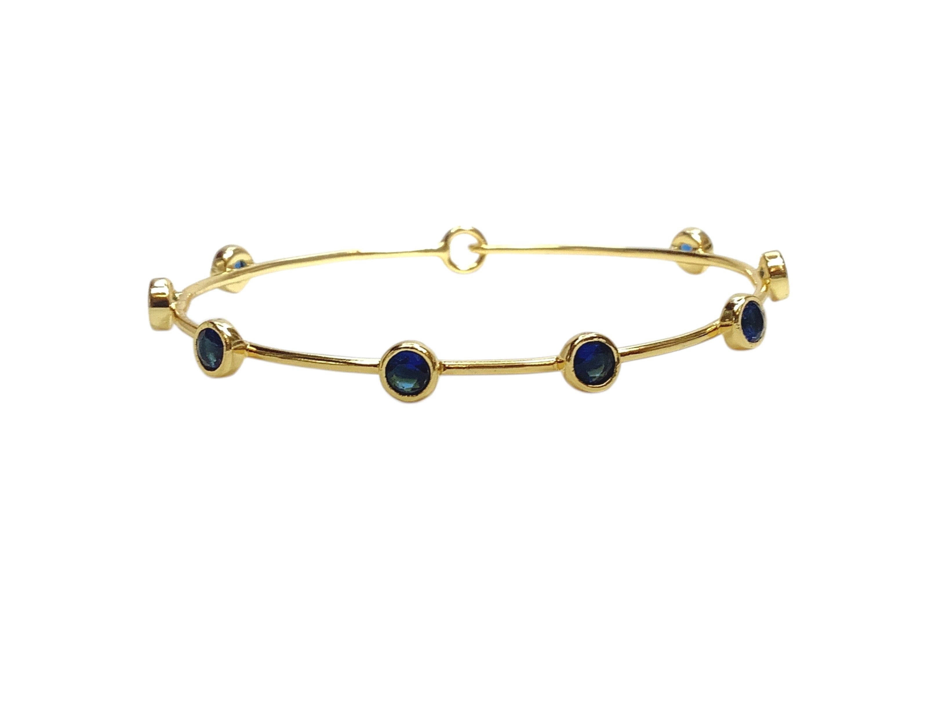 The Cindy Eight Stone Bangle Bracelet in gold with stones