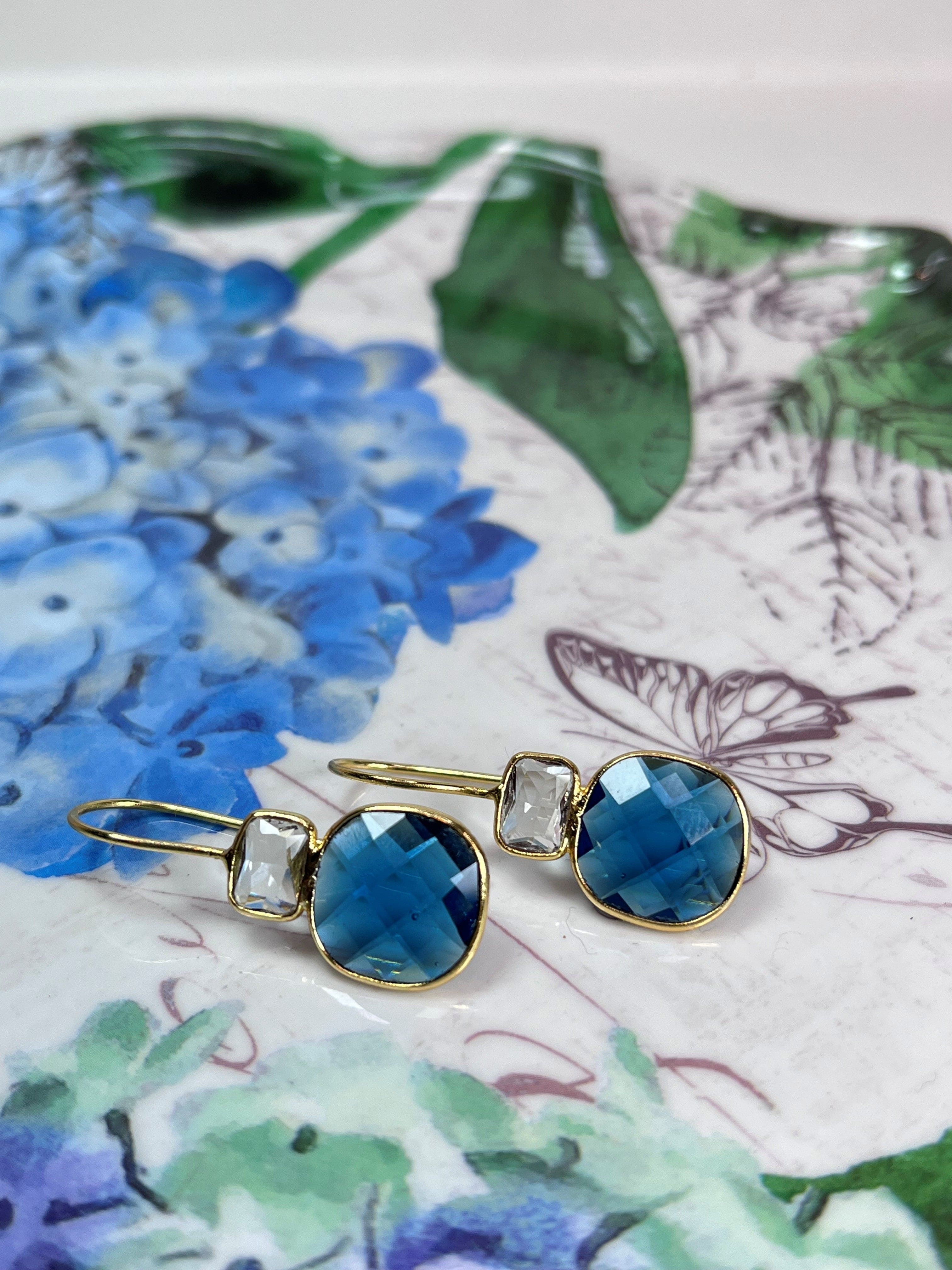 Handmade artisan earrings featuring blue semi-precious stones, elegant jewelry for any occasion.
