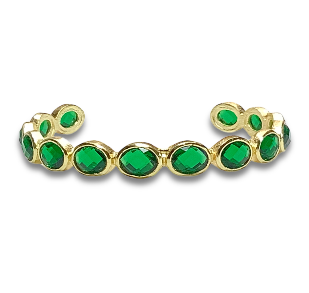 Elegant gold cuff bracelet with green semi precious stones, ideal for artisan jewelry lovers.
