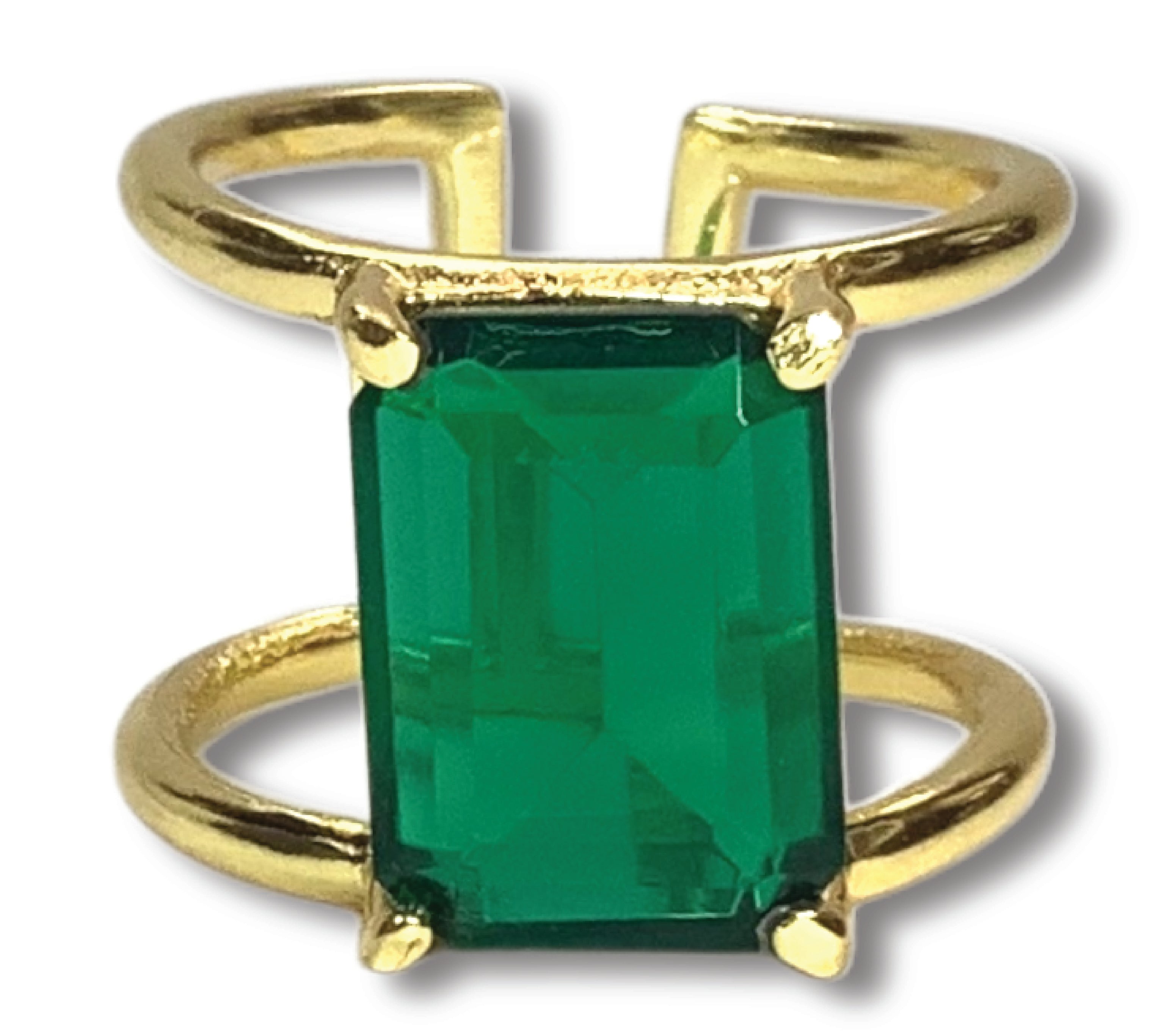 Elegant green emerald gemstone ring in a gold setting, artisan jewelry, luxury handcrafted jewelry.