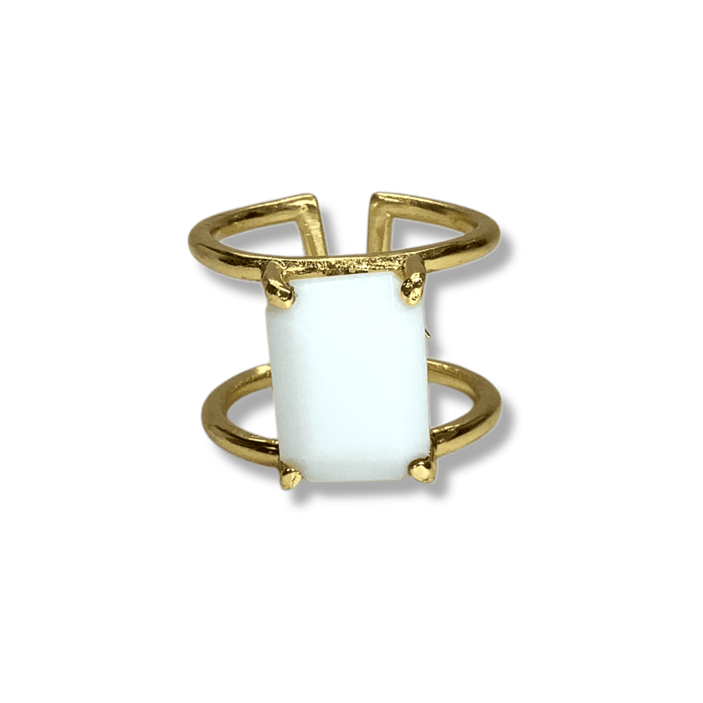 Elegant handmade gemstone ring with white stone, artisan jewelry.