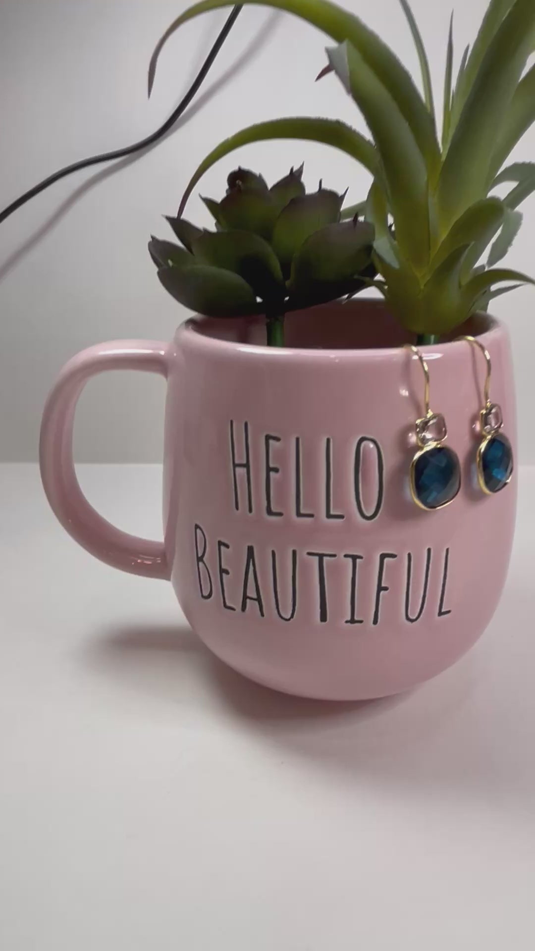 Royal Blue Quartz and Rock Crystal Hook Earrings in pink mug